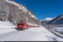 RhB Ge 4/4 II 626 mit RE Landquart - St. Moritz am 16. Januar 2021 bei Madulain.