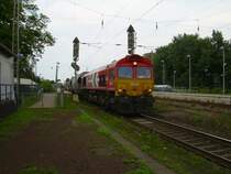 DE 64 der HGK am 25.7.2007 mit Staubgutwagenzug in D�rverden