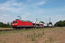Mit dem EZ 51943 (Mannheim Rbf - Basel Bad Rbf) fuhr am Mittag des 03.06.2020 die 185 089-0 aus Richtung Neulußheim kommend über die Rheintalbahn in Richtung Waghäusel.