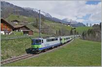 Bei Enge im Simmental ist die BLS Re 4/4 II 504 mit ihrem RE aus EW III Wagen auf dem Weg nach Zweisimmen.

14. April 2021