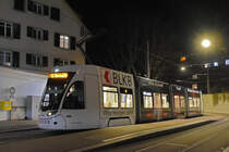 Be 6/8 Flexity 5033 mit der BLKB Werbung, auf der Linie 6, wartet in der Schlaufe an der Riehen Grenze. Die Aufnahme stammt vom 17.12.2021.