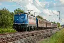 139 287-7  BayernBahn  mit Henkelzug in Thüngersheim, August 2021.