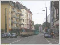 Auf der Fahrt nach Preungesheim war am 11.08.2007 der 6. Zug der U5 mit den Ptb-Triebwagen 698 (noch in alter Farbgebung) und 716 zwischen den Stationen Musterschule und Glauburgstra�e unterwegs.