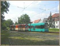Der Museumstriebwagen 112 (ex812) vom Typ N (Baujahr 1963 D�WAG) stand am 12.08.2007 bei einem Einsatz am Verkehrsmuseum Frankfurt am Main auf einem Nebengleis, als der 3. Zug der Linie 12 mit dem S-Triebwagen 234 die Endhaltestelle Schwanheim/Rheinlandstra�e verlassen hatte und sich auf die Fahrt nach Fechenheim begab.