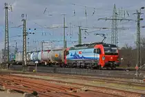 Siemens Vectron 193 475-1 durchfährt den badischen Bahnhof. Die Aufnahme stammt vom 23.02.2022.