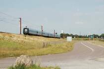 DSB IC3 5228 hat gerade die Storebeltbro verlassen und wird gleich den n�chsten Halt Nyborg(F�nen) erreichen. August 2007