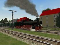 Eine Lok der BR 38, ein bei der Deutschen Bundesbahn verbliebenes Exemplar, zieht den aus Donnerb�chsen bestehenden Zug aus dem Bahnhof Menden (H�nnetalbahn). Die Lok stammt von German-Railroads