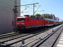 BR114 011-0 zieht hier ihren RE der Linie 1 in Richtung Eisenh�ttenstadt am S-Bahnhof Savignyplatz (Berlin) vorbei. (29.05.04)