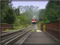 Zwei Dieselloks 2143 066 + 067 fahren mit einem Holzzug in Richtung Lavanttal.
Zeltweg 5.9.2007
