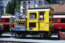 RhB - Xm 2/2 9912 II am 20.06.1999 in Davos Platz - Fahrleitungstriebwagen 2-achsig - �bernahme 17.12.1962 - RACO1633/SLM/RhB - Gewicht 12,00t - L�P 5,06m - zul�ssige Geschwindigkeit 4/8/17/30/60geschleppt km/h - �3=05.06.1990 �1=27.01.1999 - RhB-Loge in rh�toromanisch.
