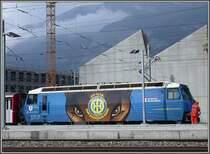 Ge 4/4 III 652 Vaz/Obervaz mit Hockeyclub Davos Werbung vor dem im Abriss befindlichen HW Geb�ude in Chur. (15.09.2007)