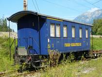 FSS = Freunde Schweizer Schmalspurbahnen - Abgestellter 1./2. Kl. Personenwagen  AB 2420 in den Farben und Beschriftung der DFB 
( ex FW BC 22) im G�terbahnhof von Interlaken Ost am 05.08.2007