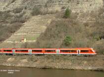RE Frankfurt - Wrzburg mit MODUS-Nahverkehrswagen am 22.03.2004 zwischen Gemnden und Wrzburg am Main.