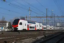 RABe 512 015-4 KISS durchfährt am 20.02.2025 den Bahnhof Pratteln.