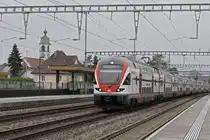 RABe 511 016 KISS durchfährt am 17.02.2025 den Bahnhof Rupperswil.
