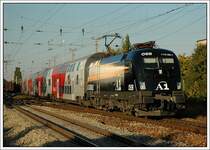 Die neueste Werbelok der �BB, 1116 280, war in den vergangenen Tagen immer auf den  Durchbindern  in und um Wien anzutreffen. Die Aufnahme enstand im letzten Licht des 30.9.2007 als R 2323 von Bernhardsthal nach Payerbach-Reichenau kurz vor der Durchfahrt der S-Bahnstation Wien Atzgersdorf-Mauer.