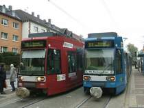 BOGESTRA Treffen ,Wagen 438B  Bochumer Symphoniker  und Wagen 430B  Vfl Bochum Bahn  beides als Linie 318 nach Bochum-Dahlhausen treffen sich an der Haltestelle Bergmannsheil(Uni Klinik)wo am heutigen Samstag Endstation ist und die Weiterfahrt mit Bussen der Bogestra nach BO Dahlhausen weitergeht.(27.10.2007) 