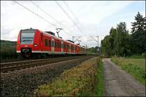 426 526/026 mit mini  DB-Keks  und 426 524/024 fahren als RE16 (RE 29683)  RUHR-SIEG-EXPRESS , von Essen �ber Hagen nach Siegen.
