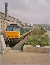 Der Nachtschnellzug aus London Paddington ist in Penzance eingetroffen. Und auch hier, ziemlich unbritish, Palmen am Bahnsteig zur Begrüßung. 
April 2004.