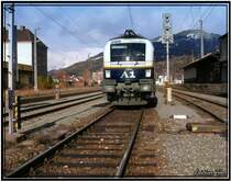 A1 Werbelok 1116 280 steht mit einem G�terzug in Leoben G�ss.
7.11.2007