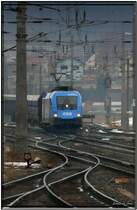 Werbe Taurus 1016 023 Kyoto f�hrt mit einem G�terzug in den Bahnhof Knittelfeld ein. 12.1.2008
