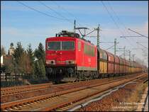 155 183 beschleunigt aus der Falkenberger Br�ckenbaustelle heraus mit ihrem PKP-Bunkerzug gen Leipzig, 03.02.08.