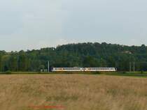 �stlich von Saverne treten die Vogesenh�hen zur�ck. In der h�geligen Landschaft ist hier ein Z11500, mit gelber MetroLOR-Beschriftung der Region Lorraine, als Regionalzug TER30349 von Metz nach Strasbourg unterwegs.

07.06.2007 bei Schwindratzheim