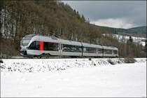 ET23003 f�hrt duch das Winterliche Sauerland als ABR99645 (RE16  Ruhr-Sieg-Express ) nach Essen Hbf. (22.03.2008)
