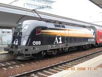 Der A1-Werbetaurus 1116 280-7 verl��t am 24.3.2008 mit einem Regionalzug den Bahnhof Floridsdorf.