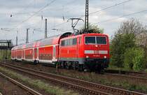 111 118 durchf�hrt mit einemRE Rheinhausen Ost in Richtung Duisburg. 18.04.2004