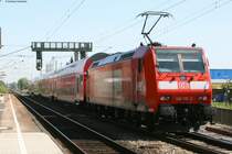 RE 31002 mit Schublok 146 110-2 bei der Einfahrt Friesenheim am 2.5.08
