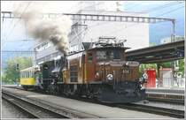 Ge 6/6 I 414, G 4/5 107  Albula  und vierachsiger Aussichtswagen verlassen als �berfuhrzug 9518 den Bahnhof Landquart Richtung Chur. Bahnhoffest Chur (25.05.2008)