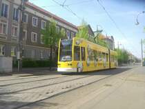 NGT 303 am 26.04.2008 vom Bahnhof in Richtung Dessau-S�d �ber Kreuzbergstra�e. Dieses Fahrzeug erhielt zwei Tage vorher die neue ansprechende Lotto-Werbung.
