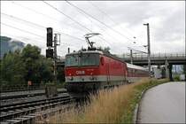 1044 095 rollt am Zugschluss einer Rola mit. Ihre Schiebeleistung wird erst f�r den Anstieg zum Terminal Brennersee ben�tigt. (04.07.2008)