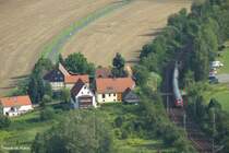Hier ein Landschaftsfoto mit Zug; Eine S-Bahn bef�hrt die Elbtalbahn in Richtung Dresden. Der Blick auf Rathen bietet sich von der Bastei. Datum: 05.08.2008