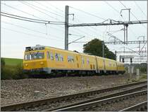 Ein DB Messzug legt sich in die Kurve zwischen Bivange und Fentange am 21.09.08. (Hans)