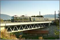 Gep�cktriebwagen 4061.13 f�hrt mit Sonderzug 16650 von Lienz nach Wien S�d, hier zu sehen bei der �berquerung der P�lsbr�cke in Zeltweg.
28.09.2008