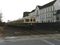 624 641-7/924 413-8/634 655-5 mit Nahverkehrszug 7070 M�nster–Gronau auf Bahnhof Gronau am 25-11-1992. Die Umgebung hat sich hier sehr ver�ndert. Bild und scan: Date Jan de Vries. 