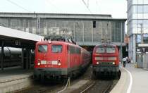 110 223 und 218 422 in M�nchen Hbf. Die 218 wird in k�rze nach M�hldorf abdieseln (M�nchen, 11.8.2008)