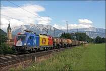 Wechsel vom Chiemgau ins Inntal: Nach nur ca. 32 Km Landstra�e die in ungef�r 40 Minuten zur�ckgelegt wurden konnte die 1116 056  Rum�nien  mit dem 44865 von Kufstein nach Freilassing(? vor der Kullisse des Klosters Raisach und dem Wilden Kaiser auf den Chip gebannt werden. Gru� an  Lastabwurf .