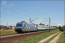 101 102 (9180 6 101 102-2 D-DB)  WIR MENSCHEN SIND ALLE GLEICH!  �berraschte mich leider mit dem IC 88  Leonardo da Vinci , Milano Centrale - M�nchen Hbf, bei Osterm�nchen. Immerhin wurde der Stromabnehmer nicht kommplet im Masten  versenkt . Im Hintergrund ist die Kirche von Osterm�nchen zusehen.
