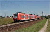 426 029/529 und ein 425er legen sich bei Osterm�nchen, als RB 30056 auf der Fahrt von Rosenheim nach M�nchen Hbf, in die Kurve. Mit dieser Regionalbahn wird die Verbindung zum Heimatwerk M�nchen-Steinhausen hergestellt. (10.07.2008)