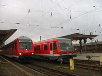 Hier sieht man einen Doppelstocksteuerwagen der 2.Gattung Bezeichnung DABpbzfa. Man sieht ihn hier in Worms neben dem 628-480 ich hoffe dieses Bild gef�llt euch wenn nicht schreibt es ins Forum.