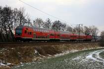 RE 26112 von Zwickau nach Leipzig Hbf, hier kurz nach dem Halt in G��nitz, 01.02.09