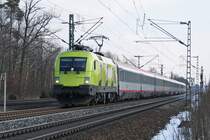 Die Telekom Lok 1116 033 mit EC 262 am 31.01.2009 in Haar.