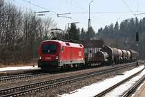 1116 112 mit einem gemischten G�terzug am 28.02.2009 in A�ling.