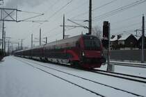 �BB Railjet RJ 63 von M�nchen nach Budapest mit 1116-208 am Zugschlu� kurz vor Salzburg unterwegs.  28.02.09