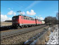 140-857 mit einer weiteren 140 am schweren Holzzug bei Beratzhausen.(KBS 880)