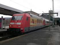 Werbeloks 2009 - Mit dem Ersatz-IC 79693 zu ICE 693 steht am 10.03.2009 die 101 035  ARD-Buffet  in Stuttgart Hbf und wartet auf die Ausfahrt. man beachte die Lackausbesserungen an der Front der Lok.