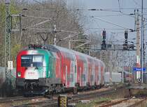 1016 025 EM-Portugal saust in K�rze in Wien Penzing durch. Wenige Sekunden nach diesem Foto ist mir eine Wei�wurst (aka ICE) Richtung Wien West ins Bild gefahren.... (4.4.2009)